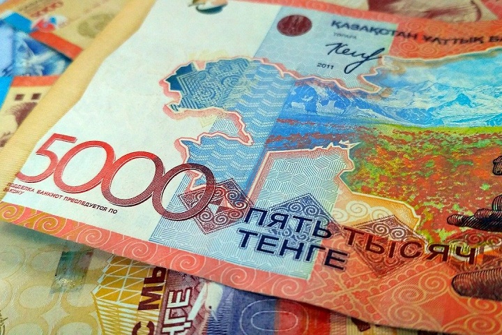 Тенге. Optimism.kz